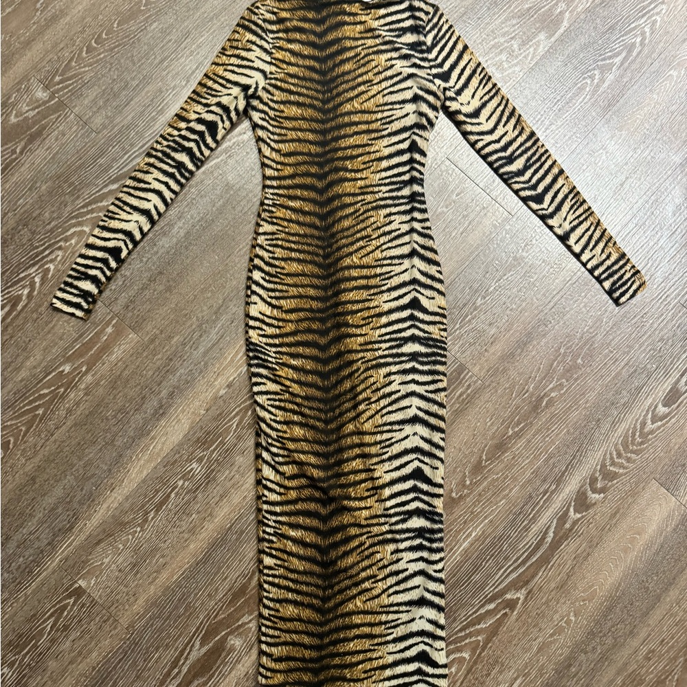 Meshki Leopard body con dress. Super silky super fitted.